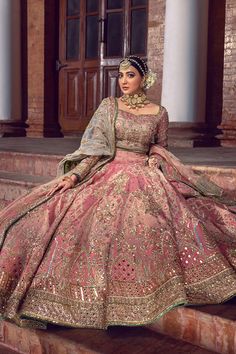 Tissue Lehenga Choli Bridal Dress Pakistani is in alluring gulabi pink shade hand-embellished with pearls, gota, resham, and dabka. Lavish designs and fine details make this breathtaking Bridal Lehenga Choli your foremost priority for the wedding day. Choli: Bridal choli in premium tissue is a perfect stitched attire to pair with Lehenga. The choli is hand-embellished with gota, mirror, tilla, and resham. Floral designs, gota, and dabka gives a traditional touch to this beautiful tissue choli. T Latest Bridal Lehenga Designs, Pakistani Bridal Dress, Bridal Lehenga Designs, Latest Bridal Lehenga, Wedding Lehenga Designs, Indian Bride Outfits, Bridal Lehenga Collection, Latest Bridal Dresses, Designer Bridal Lehenga