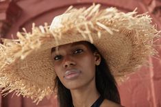 Shield yourself from the sun in style with the Ete, your statement piece of the summer. Made from a dual layer of woven raffia straw with bohemian frayed edge, this is the style that will make heads turn. Natural Crochet Band Frayed edge detailing 100% Raffia Made in New York City Gigi Burris Millinery was founded to preserve the romantic craft of millinery, we work to ensure timeless design and thoughtful craftsmanship in every piece produced. We are a female-owned company dedicated to responsi Summer Sun Straw Hat Made From Palm Leaf, Summer Palm Leaf Sun Straw Hat, Chic Natural Color Palm Leaf Hat, Natural Straw Beach Hat, Chic Handwoven Fedora Straw Hat, Chic Handwoven Toquilla Straw Panama Hat, Palm Leaf Sun Hat For Summer, Chic Beach Straw Hat, Straw Hat For Sunbathing In Spring