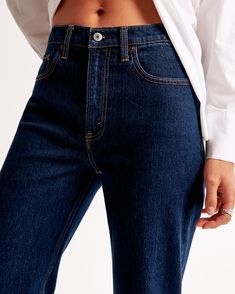 Elevate your wardrobe with the timeless sophistication of Abercrombie & Fitch's Women's High Rise Vintage Straight Jean. Designed to flatter, these jeans feature a statuesque 10.5” high rise and a relaxed fit through the waist and hips, culminating in a chic straight-leg silhouette. The super dark wash and clean hem lend a sleek, versatile finish, making these jeans a perfect staple for any fashion-forward ensemble.

- Size: 32 LONG
- Color: Super Dark
- Material: Pocket Bag - Polyester, Cotton Classic High Rise Denim Blue Flare Jeans, Classic Rigid Denim Flare Jeans For Everyday, Classic Flare Jeans In Rigid Denim For Everyday, Classic High Rise Rigid Denim Jeans, Classic Mom Fit Denim Bottoms, Straight Dark Wash Jeans For Everyday, Everyday Straight Dark Wash Jeans, Dark Wash Rigid Denim Cropped Jeans, Classic Mom Fit Denim Blue Bottoms