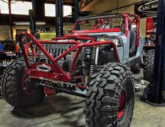 an off road vehicle is parked in a garage