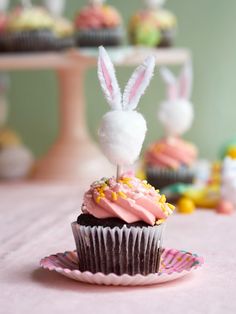 some cupcakes with bunny ears on top of them