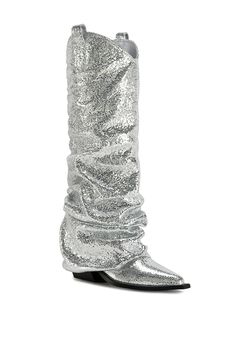 The SHAWNEE-SILVER FOLD OVER WEDGE BOOT is a must-have statement piece for any fashion-forward enthusiast. With its textured metallic silver design and western-inspired details, this boot is sure to turn heads. The added scrunched fold over accent and black sole add an extra touch of style. Shaft Height: 14.5" Circumference: 15" Heel Height: 2.75" Shoe Games, Sequin Shoes, Silver Boots, Tour Outfits, Azalea Wang, Sandal Platform, Western Booties, Pretty Party, Silver Design