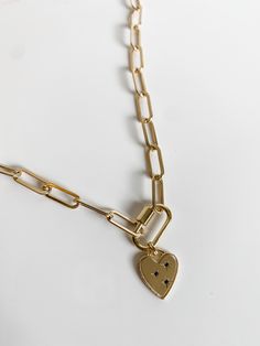 This is the Zoe thick chain paired with the carabiner clasp and a charm. Add any charm from the list to customize it! The image of the model wearing the necklace is a 16 inch chain, but please measure you neck for the best fit. all chains are 14k gold filled Carabiner is vermeil gold Heart Gift Wrapping, Lock Necklace, Gold Jewelry Necklace, Gold Charm Necklace, Jewelry Lookbook, Minimal Jewelry, Heart Gifts, Jewelry Inspo, Gold Chain Necklace