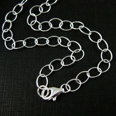 "Material: 925 Sterling silver made in Italy. The chain size is about 8mm long, 6mm wide. Length - 7, 7.5\" (Bracelet), 9.5, 10\" (Anklet), 16- 36 inches (Necklace) Quantity - 1 piece. SKU: 601046 For this chain in gold plated sterling silver, click here: https://www.etsy.com/listing/500243175 Please convo me for large quantity. Pictures show the shape of the chain,for actual size please read the measurement. For our entire selection of chunk chains, click here: https://www.etsy.com/shop/BeadUni Silver Oval Link Charm Bracelet, Silver Charm Bracelet With Oval Link, Sterling Silver Oval Link Charm Bracelet, Sterling Silver Oval Link Chain Charm Bracelet, Oval Link Sterling Silver Charm Bracelet With Chain, Sterling Silver Rolo Chain Bracelet With Oval Links, Sterling Silver Rolo Chain Bracelet, Gift, Oval Link, Sterling Silver Rolo Chain Bracelet Gift, Chunky Silver Necklace