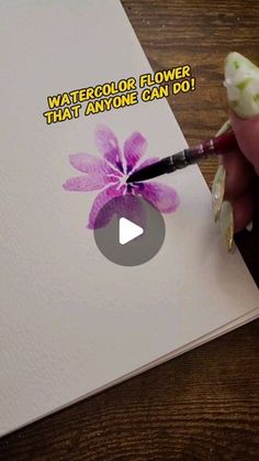 someone is painting a flower with watercolors on paper and writing that anyone can do it