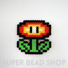 an image of a pixel art brooch with the word sale spelled out on it