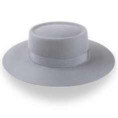 Description Materials Craftsmanship Hat Care Shipping Returns Product Description A Grey Wide Brim Hat with Classic Western Appeal Elevate your wardrobe with The Mesa, a grey wide-brim western hat crafted from durable rabbit fur felt. This luxury hat offers a smooth finish and a comfortable fit, making it perfect for both casual and formal occasions. The 3 1/2" raw-edge flat brim provides ample shade, while the telescope crown design adds a classic Western touch. Customizable in a variety of col Outdoor Hut, Hats For Big Heads, Luxury Hats, Homburg, Chapeau Cowboy, Western Hat, Trilby Hat, Cotton Drawstring Bags, Crown Design