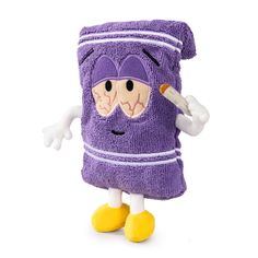 a purple towel with a cartoon character holding a toothbrush in it's mouth