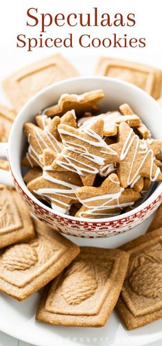 a bowl filled with cookies on top of a white plate next to some cut up cookies