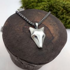 The wolf is one of the most striking in the realm of spirit animals. The power of the wolf brings forth instinct, intelligence, endurance, appetite for freedom, and awareness of the importance of social connections. Our adopted stray dog Luca modeled for this sculptural sterling silver pendant.  Looks great on both men and women.  You can order it with  *a beautiful thick (2.5mm) woven style chain. These have a gorgeous texture, very comfortable and durable. made of sterling silver, and oxidized Motif Ideas, Oak Leaf Earrings, Wolf Pendant Necklace, Mythology Jewelry, Wolf Pendant, Silver Coin Necklace, Wolves Pendants, Wolf Necklace, Wolf Jewelry