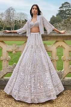 Beige jacket with sequin, crystal, bead, thread embroidery in floral pattern. Paired with sweetheart neck embroidered padded blouse and attached cancan lehenga. - Aza Fashions Jacket Lehenga Designer, Flowy Jacket, Strappy Blouse, Jacket Lehenga, Haldi Dress, Seema Gujral, Bridal Indian, A Royal Affair, Lehenga Pattern