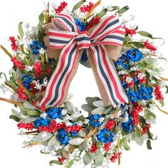 PRICES MAY VARY. [Patriotic Flowers Door Wreath] Red white blue flowers express strong patriotic atmosphere, to make the wreath fresh and life looking, this patriotic wreath selected lamb ears. The whole memorial day wreath looks full and have a valuable looking. [20 Inch Forth Of July Wreath] The outer diameter of this 4th of July flower wreath measures 20 Inch, this size is really suitable for who are seeking the large size and leafy full wreath for home decoration, such as hanging on the fron Red White Andblue Wreath, Wreath Sprays July 4, St Louis Blues Wreath, Red White Blue Flowers, Lamb Ears, July Flower, Blue Flower Wreath, Patriotic Flowers, White Blue Flowers