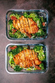 two plastic containers filled with chicken and broccoli on top of a brown table