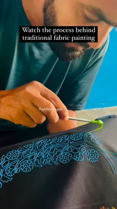 a man is working on some fabric with a quote about the process behind it that says, watch the process behind traditional fabric painting