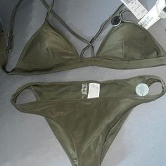 Forever 21 - Olive Green Strappy Bikini Top & Low Rise Bottoms (Medium) New With Tags! Bikini Top & Bottom Sold Together. Shell: 81% Nylon/Polyamide 19% Spandex/Elastane Lining: 92% Polyester 8% Spandex Hand Wash Cold Do Not Iron Or Dry Clean Summer Stretch Swimwear By Forever 21, Trendy Forever 21 Swimwear For Summer, Forever 21 Triangle Top Swimwear For Swimming, Forever 21 Triangle Top Swimwear For Vacation, Forever 21 Stretch Swimwear For Beach Season, Forever 21 Triangle Top Beachwear Swimwear, Forever 21 Triangle Top Swimwear For Summer, Forever 21 Triangle Top Swimwear, Casual Forever 21 Swimwear For Beach