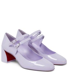 Christian Louboutin revives classic Mary Jane styles with the Miss Jane pumps. They're made from glossy patent leather with dual buckle straps, and block heels -all in a lovely lavender hue. | Christian Louboutin Miss Jane patent leather pumps Luxury Brand Shoes, Louboutin Online, Dr Shoes, Mid Heels Pumps, Paris Woman, Jane Shoes, Carrie Bradshaw, Patent Leather Pumps, Pretty Shoes