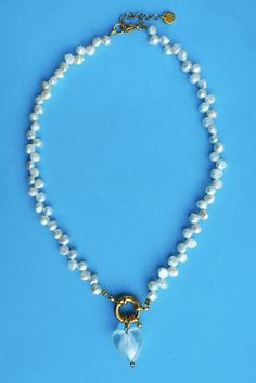 This necklace has our heart! Made with a freshwater pearls, glass shaped heart, and 24K gold plated round clasp.Length: 15 inches Handmade in Greece. Crystal Light, Color Crystal, Fresh Water, Light Green, Freshwater Pearls, Greece, Gold Plate, Product Launch, Plating