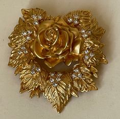 "Elizabeth Taylor for Avon Rose clear rhinestone matte gold, satin gold  Brooch  Very good condition  size - 2 1/2\" x 2 1/4\"  made in 1990-s  marked: Elizabeth Taylor E Avon  05/26/23" Gold Brooches For Formal Valentine's Day, Gold Brooches For Valentine's Day Formal, Gold Brooches For Valentine's Day, Gold Brooch, Gold Satin, Joan Rivers, Gold Brooches, Elizabeth Taylor, Clear Rhinestones