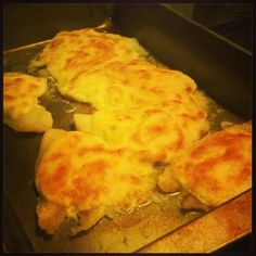 some food is cooking in a pan on the stove top and ready to be eaten