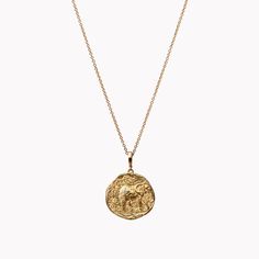 Limited edition ĀZLEE necklace with a large elephant coin charm, handcrafted in 18K yellow gold with a single diamond. Delicate grape vines drape beside the elephant motif, framed by the coin’s textural, raw edges. Wear alone to highlight the bold 27mm pendant, or layer this limited-edition piece into your necklace stack. Each of ĀZLEE’s charms feature a clasp that opens and closes, allowing you to add on to or remove from any chain. Elephant Motif, Necklace Stack, Limited Editions, Grape Vines, Charm Necklace, Vines, Gold Necklace, Coin, Elephant