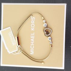 Michael Kors Goldtone Adjustable Bracelet Elegant Michael Kors Metal Jewelry, Michael Kors Earrings, Rose Gold Bangle Bracelet, Michael Kors Bracelet, Gold Michael Kors Watch, Monogram Bracelet, Locket Bracelet, Rose Gold Bangle, Open Cuff Bracelet