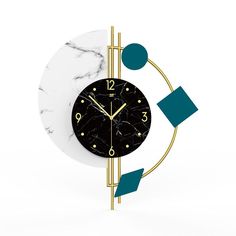 a black and white clock with gold trim around it's face on a marble wall