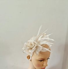 Dear Buyers  as Royal Mail on Long Strike so i will use other shipping service for send orders to you and order will deliver on timr..ThanksCream ,Ivory Colour Fascinator With Flower Headband and Clip Wedding Hat,Royal Ascot Ladies Day Size: approx :- 16cm x 13cm Small Size  Material:-,Feathers,Sinamay  Note :- I can't accept return.. Thanks White Mini Hat Headband For Ceremony, White Summer Wedding Headband, White Headband Mini Hat For Wedding, Adjustable White Headpiece For Ceremony, Adjustable White Headpiece For Ceremonies, White Fascinator Headband With Handmade Flowers, White Fascinator With Handmade Flowers, White Handmade Flowers Fascinator Headband, White Hair Accessories For Kentucky Derby