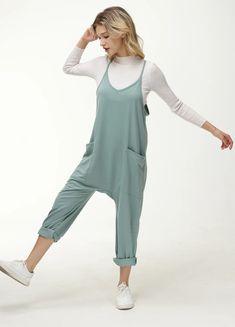 Step into effortless style with our Womens Casual Wide-Leg Jumpsuit. Crafted from a soft and breathable fabric, this jumpsuit offers a relaxed fit with its flowy wide-leg design and adjustable spaghetti straps for personalized comfort. Practical pockets provide convenience, while the gathered ankle cuffs give a modern twist. Ideal for a laid-back day or dressing up with accessories. Over 20,000+ customers have given us positive reviews Perfect for Pregnant: these stylish and comfortable jumpsuit Elastic Waistband Leggings, Loose Fit Jumpsuit, Long Pant Jumpsuit, Cozy Pants, Flowy Design, Baggy Style, Casual Wear Women, Off Shoulder Fashion, Stretchy Pants