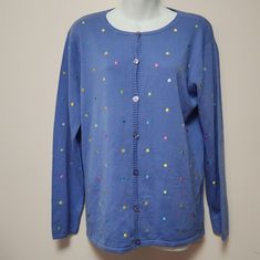 This Is New With Tags And Is A 7 Button Down Sweater In A Nice Blue Color And Colorful Dots That Are Like Polka-Dot Pattern. 55%Acrylic 45% Cotton Embroidery Dots 100% Polyester. A34595 Chest 40" Length 26 Blue Winter Tops With Snap Buttons, Blue Button Cardigan For Spring, Blue Cardigan With Buttons For Spring, Blue Cardigan For Spring, Blue Crew Neck Cardigan With Button Closure, Blue Button-up Sweater With Buttons, Blue Crew Neck Sweater With Button Closure, Blue Sweater With Button Closure, Spring Blue Sweater With Button Closure