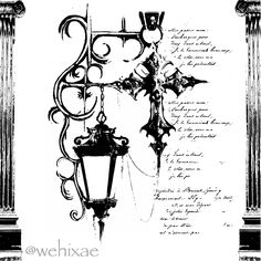 an old fashioned street light with ornate designs on it's side and the words written in