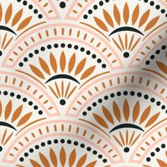 an orange and white pattern with black dots on the top, in front of a light pink background