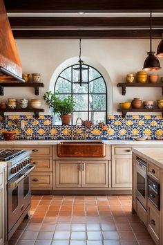 ❤️ Save for later 👉 Tap to see all 60+ Spanish Style Kitchen Ideas | Your cooking space deserves the warmth and charm of timeless European design. This Spanish mediterranean kitchen brings together rich textures and natural elements for the perfect blend of comfort and style. Save these stunning ideas to create your dream cooking sanctuary! Spanish Villa Kitchen Hacienda Style, Small Spanish Kitchen, Spanish Farmhouse Kitchen, Spanish Villa Kitchen, Spanish Style Kitchen Ideas, Modern Spanish Style Kitchen, Spanish Tile Kitchen, Modern Spanish Kitchen, Spanish Revival Kitchen