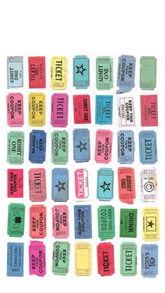 a bunch of colorful tickets sitting on top of each other in front of a white background