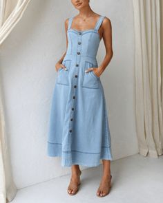 blue denim midi dress thick adjustable straps  sweetheart neckline faux button detailing lining front of dress front pockets  back zip entry  cinched at the waist for a flattering fit A-line skirt  fabric: cotton / polyester with some stretch (lined bust only) Size 6/XS 8/S 10/M 12/L 14/XL Bust 78cm 83cm 88cm 93cm 98cm Waist 63cm 68cm 73cm 78cm 83cm Hip 86cm 91cm 96cm 101cm 106cm Summer Midi-length Denim Dress With Pockets, Summer Midi Denim Dress With Pockets, Summer Medium Wash Midi Dress With Pockets, Medium Wash Midi Dress With Pockets For Summer, Summer Midi Dress With Pockets In Medium Wash, Spring Midi Denim Dress With Pockets, Spring Midi-length Denim Dress With Pockets, Casual Cotton Denim Dress With Pockets, Spring Denim Blue Dresses With Buttoned Pockets