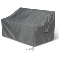 an outdoor furniture cover on the ground