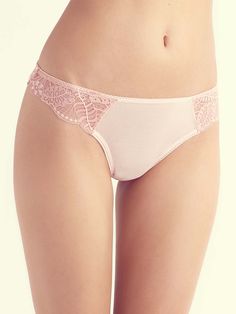 Quick Overview: Thong Cotton crotch Lace waist band Shell: 88% Polyamide, 12% Elastane; Lining: 100% Cotton Description & Fit Tips Pair your "Cecilia" [Y002] petite bra with this matching lace thong. The thong features romantic lace sides and a lace-up back detail for a hint of seduction. This thong is comfortable and a little stretchy. Staff member's hip measurement: 34 in. Generic panty size: Small TLBC panty size: Medium Our panties are cut on a petite scale, similar to our bras, so you will Petite Lingerie, Petite Body Types, Small Bra, Bra Measurements, Lace Side, Romantic Lace, Lace Thong, Bra Styles, Bra Cups