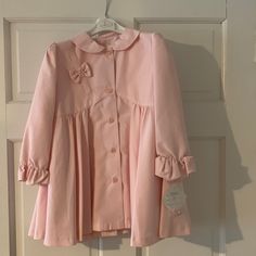 Girls Size 4 Pale Pink Spring Coat. Great For Easter! Never Worn. Cute Long Sleeve Outerwear With Buttons, Pink Ruffled Long Sleeve Outerwear, Cute Long Sleeve Outerwear With Button Closure, Cute Ruffled Long Sleeve Outerwear, Pink Long Sleeve School Outerwear, Cute Long Sleeve Ruffled Outerwear, Long Sleeve Outerwear With Buttons For School, Cute Spring Outerwear For School, Cute Spring Outerwear With Buttons