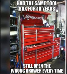 a red toolbox with the words, had the same tool box for 10 years still open the wrong drawer every time