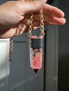 Rhodonite point wrapped in leather and suspended from gold tone chain. Crystal Necklaces, Handmade Shop, Crystal Necklace, Necklace Etsy, Gold Tones, Etsy Accessories, Handmade Jewelry, Accessory Gift, Jewelry Necklaces