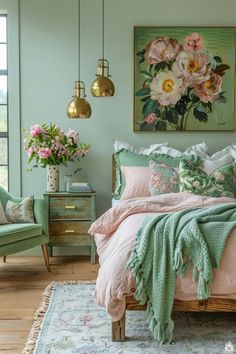 a bedroom with green walls and pink flowers on the bed, along with two chairs