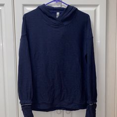 Never Worn Lululemon Sweatshirt Lightweight Hoodie Very Soft Material Size 6 Has Thumb Holes In Sleeve Has Small Pockets On Hand Reflective Lining On Sleeve And Lululemon Logo On Back Of Jacket Navy Blue Blue Hoodie Top For Workout, Blue Workout Hoodie Top, Sporty Long Sleeve Sweatshirt For Relaxation, Comfortable Hooded Workout Tops, Cozy Workout Top With Drawstring Hood, Blue Athleisure Hoodie For Workout, Blue Long Sleeve Activewear With Drawstring Hood, Cozy Hoodie Tops For Workout, Cozy Hooded Tops For Workout