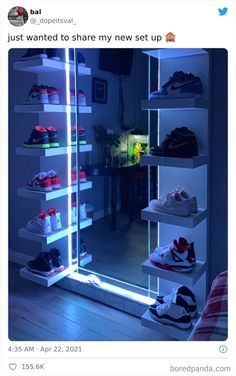 an illuminated shoe rack in the corner of a room