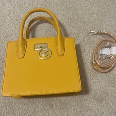 Mustard Yellow Bag, Brand New With Handled And Long Strap That Is Removable. Gold Satchel With Detachable Handle For On-the-go, Chic Gold Box Bag With Branded Hardware, Trendy Square Satchel With Branded Hardware, Trendy Gold Satchel For On-the-go, Trendy Box Bag With Branded Hardware, Trendy Everyday Box Bag With Branded Hardware, Trendy Satchel With Double Handle And Branded Hardware, Gold Satchel With Branded Hardware For Shopping, Trendy Satchel With Branded Hardware For Shopping