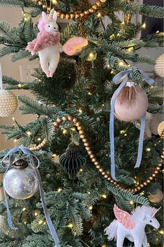 a christmas tree with ornaments hanging from it