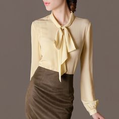 Material:SilkClothing Length:RegularCollar:O-NeckGender:WOMENDecoration:BowSleeve Length(cm):FullSleeve Style:RegularStyle:Office LadyPattern Type:Solid Office Silk Top With Collar, Silk Office Top With Collar, Elegant Yellow V-neck Top, Elegant Beige Semi-formal Tops, Elegant Beige Top For Semi-formal Occasions, Elegant Yellow Summer Shirt, Elegant Yellow Formal Tops, Yellow Long Sleeve Party Tops, Gold V-neck Blouse For Work