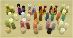 many different colored candles are arranged in rows