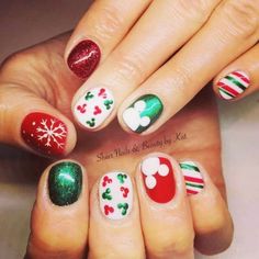 For those that love to dress up their nails for the holidays here is a list of nail designs you can try on short nails. If you have Christmas joy then these designs are definitely filled with them. #Christmasnaildesigns #Christmasnailart #Naildesignsonshortnails #nailartonnatural nails Disney Christmas Manicure, Disney Christmas Dress, Christmas Nail Designs Disney, Disney Christmas Gel Nails, Disney Christmas Pedicure, Mickey Nails Christmas, Mickey Mouse Christmas Nails Design, Mickey Mouse Nail Art Design, Christmas Disney Nails Short