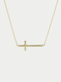 This delicate gold cross necklace is perfect for everyday wear! The dainty cross and chain make it easy to keep on and style with any outfit! Everyday Cross Necklace With Clavicle Chain, Gold Cross Necklace With Delicate Chain For Everyday, Everyday Gold Cross Necklace With Delicate Chain, Everyday Cross Charm Necklace With Adjustable Chain, Everyday Clavicle Chain Cross Necklace, Everyday Cross Charm Necklace With Clavicle Chain, Simple Gold Cross Pendant Necklace, Minimalist Cross Charm Necklace With Adjustable Chain, Simple Cross Necklace With Delicate Chain