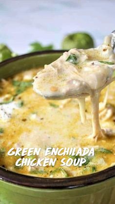 green enchilada chicken soup in a bowl with a ladle scooping out