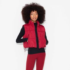 Lightweight puffer vest from Wild Fable™ in a crop length. Designed with mock turtleneck in a casual-fit cut. Side pockets help stash away small items. Front full-length zipper provides extra warmth and versatile styling. If you're not satisfied with any Target Owned Brand item, return it within one year with a receipt for an exchange or a refund. Wild Fable™: A look for every story. Maroon Puffy Vest Outfit, High Neck Cropped Puffer Vest, Fitted Red Sleeveless Sweater Vest, Red Faux Fur Vest, Red Puffer Vest, Womens Puffer Vest, Turtleneck T Shirt, Long Puffer, Shipt Shopper